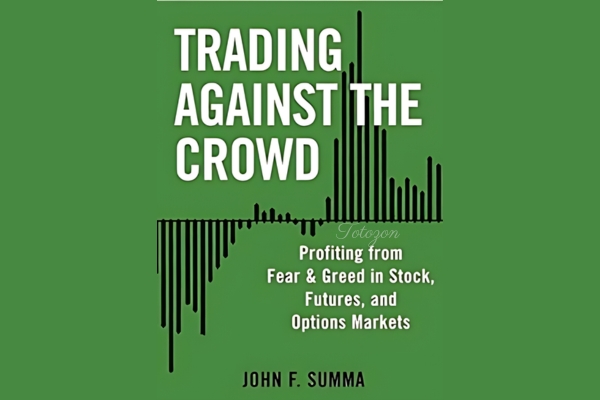 Trader analyzing charts, representing contrarian trading strategies by John Summa.