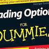 Trader analyzing options charts and strategies in a book.