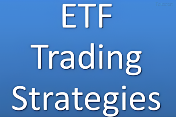 A group of traders participating in a leveraged ETF trading workshop, analyzing market data on computers