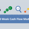 A person analyzing a 13-week cash flow model on a computer screen