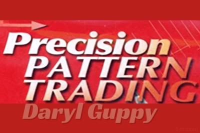 A trader analyzing chart patterns using Daryl Guppy's Precision Pattern Trading strategy.