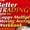 A trader analyzing charts using the Guppy Multiple Moving Average Workbook by Daryl Guppy.