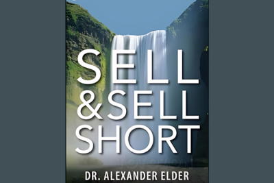 A trader analyzing stock charts, representing strategies for selling and short selling.