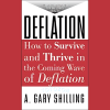 A. Gary Shilling analyzing economic data, symbolizing the study and understanding of deflation and its impacts.