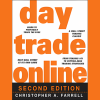 Christopher Farrell holding his book Day Trade Online at a trading seminar