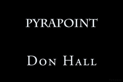 D.E. Hall explaining Pyrapoint with a financial chart in the background. image