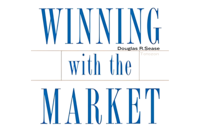 Douglas R. Sease discussing market trends at a financial seminar.