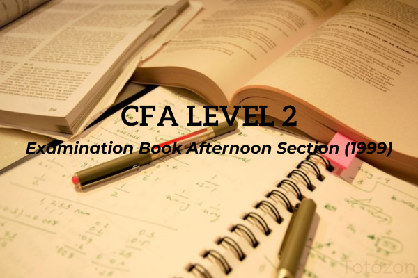 Focused analysis of CFA exam materials with charts and graphs on the table