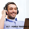 Forex trader analyzing currency charts on a computer screen during a live trading session.