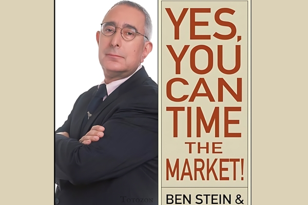 Image of Ben Stein's book Yes You Can Time the Market! on a desk with financial charts in the background.