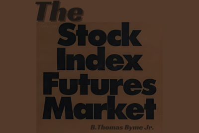 Image of a trader analyzing stock index futures on multiple computer screens, illustrating complex market analysis techniques.