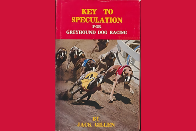 A bettor analyzing greyhound racing form and placing a bet