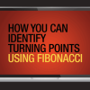 A trader analyzing Fibonacci retracement levels on a financial chart to identify potential market turning points