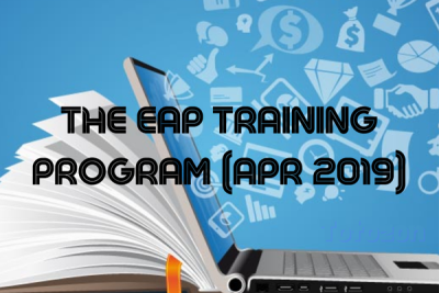 Trader analyzing charts with EAP Training Program materials